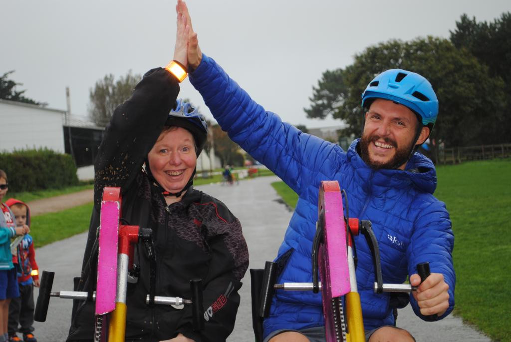 Riding adapted bike together