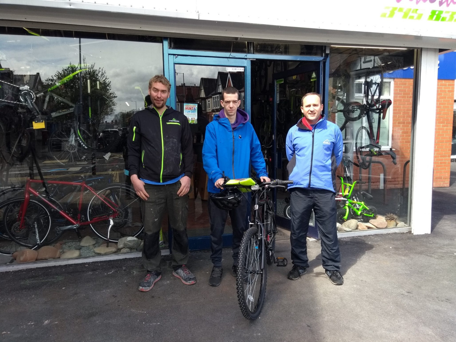 Jared collecting his bike