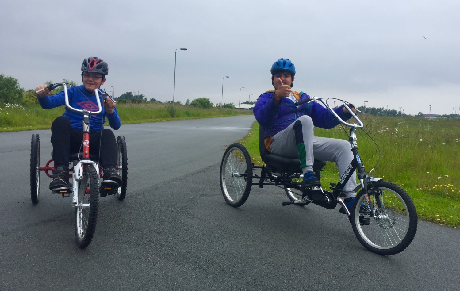 Thumbs up on adapted cycle