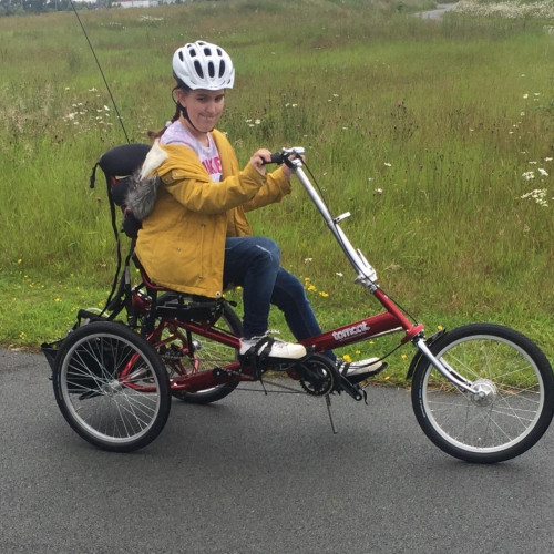 Riding adapted cycle in the park thumbnail