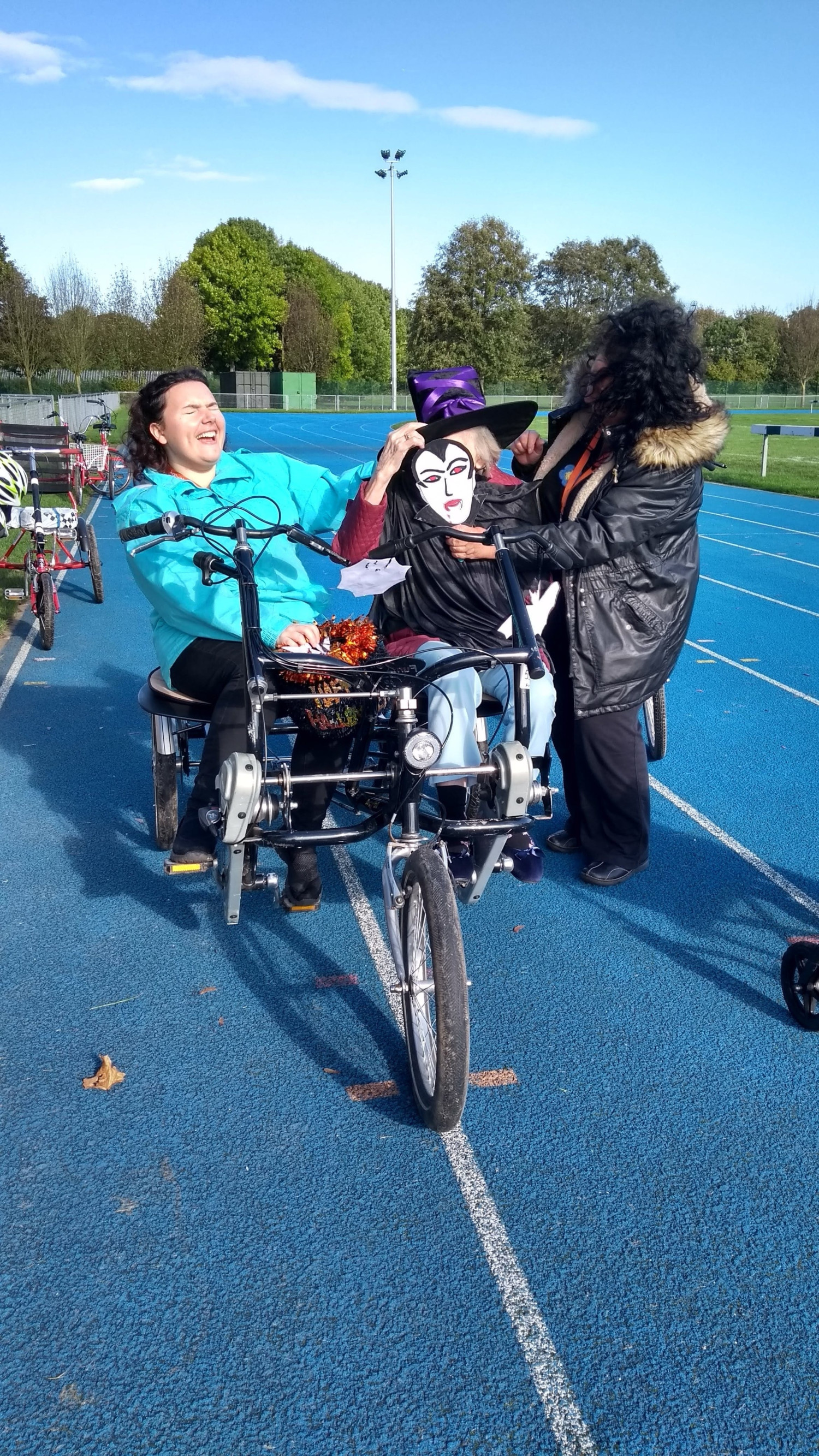 Trying on Halloween masks